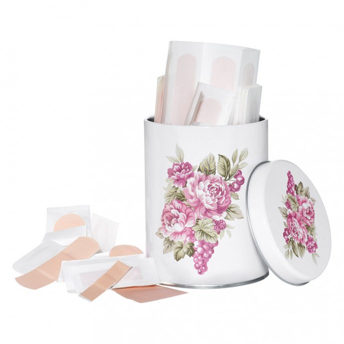 Mit rosafarbenen Blumen verzierte Pflasterdose aus der einige Pflaster herausragen