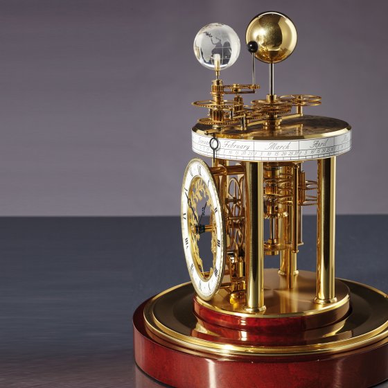 Pendule astrolabe laiton/acajou 